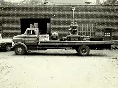 Vintage Refrigeration Equipment Co. delivery truck transporting industrial machinery, Cedar Rapids, IA.